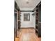 Walk-in closet with custom shelving and wood flooring at 703 Somerset Dr, Lawrenceville, GA 30046