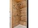 Elegant shower with tile surround and built-in seating at 703 Somerset Dr, Lawrenceville, GA 30046