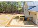 View of a large wooden back deck with railings, ideal for enjoying the outdoors at 195 W Fork Way, Temple, GA 30179