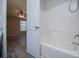 Bathroom with shower stall and view to bedroom, showcasing the tile surround and design at 195 W Fork Way, Temple, GA 30179