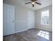 Bedroom with natural light, closet space and new flooring at 195 W Fork Way, Temple, GA 30179