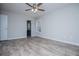 This bedroom features a ceiling fan, a window, and luxury vinyl plank flooring at 195 W Fork Way, Temple, GA 30179