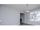 A bright living area with wood-look floors, window and view to fireplace at 195 W Fork Way, Temple, GA 30179