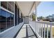 Relaxing front porch offering views of the surrounding neighborhood and mature trees at 195 W Fork Way, Temple, GA 30179