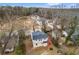 An aerial view of the home with its mature trees and surrounding neighborhood at 2370 Mcafee Rd, Decatur, GA 30032