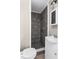 Bathroom features a tiled shower, updated fixtures, and vanity at 2370 Mcafee Rd, Decatur, GA 30032