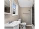 Bathroom with vanity, gray tiled shower, and a window at 2370 Mcafee Rd, Decatur, GA 30032