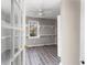 Bright bedroom with storage shelves, vinyl plank floors and a window at 2370 Mcafee Rd, Decatur, GA 30032