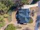 Aerial view of a well-maintained home showcasing its layout, landscaping, and surrounding neighborhood at 4780 Woodruff Trce, Cumming, GA 30028