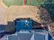 Aerial view of a backyard deck, complete with seating and manicured lawn at 4780 Woodruff Trce, Cumming, GA 30028