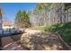 Grassy backyard provides space for outdoor activities at 4780 Woodruff Trce, Cumming, GA 30028