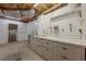 Large unfinished basement with storage shelves and door at 4780 Woodruff Trce, Cumming, GA 30028
