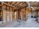 Unfinished basement with exposed beams and framing, offering customization potential at 4780 Woodruff Trce, Cumming, GA 30028