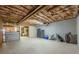 Unfinished basement offering ample storage space and exposed ceiling beams at 4780 Woodruff Trce, Cumming, GA 30028
