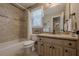 Cozy bathroom featuring a shower/tub combination and decorative elements at 4780 Woodruff Trce, Cumming, GA 30028
