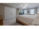 Bright and airy bedroom with natural wood trim, large closet, and ensuite bathroom at 4780 Woodruff Trce, Cumming, GA 30028