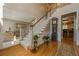Welcoming foyer with hardwood flooring, staircase, and an open layout leading to the living spaces at 4780 Woodruff Trce, Cumming, GA 30028