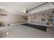 Spacious two-car garage with ample room for vehicle storage and other items at 4780 Woodruff Trce, Cumming, GA 30028