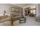 Formal living room featuring neutral tones, decorative molding, and an elegant, traditional aesthetic at 4780 Woodruff Trce, Cumming, GA 30028