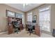 Spacious home office with two workstations, natural light, and functional decor at 4780 Woodruff Trce, Cumming, GA 30028