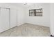 Clean bedroom with light gray wood floors and a large window, bright space at 1066 Cleavemark Dr, Clarkston, GA 30021