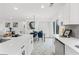 Stylish kitchen with white countertops, stainless steel appliances, and adjacent dining space at 1066 Cleavemark Dr, Clarkston, GA 30021