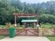 Entrance to Mason Mill Garden Club with decorative fence and signage at 1112 Central Park Rd, Decatur, GA 30033