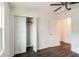 Neutral bedroom featuring a window and closet at 2330 Lago Dr, Jonesboro, GA 30236