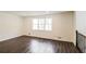 Bonus room with hardwood flooring and a large window at 2330 Lago Dr, Jonesboro, GA 30236