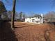 Large, fenced backyard perfect for outdoor activities, featuring a traditional exterior at 2716 Wynford Sw Ave, Marietta, GA 30064