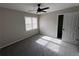 Comfortable bedroom with a ceiling fan, natural light, and easy access to closet at 2716 Wynford Sw Ave, Marietta, GA 30064