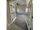 Beautiful bedroom with a tray ceiling, plush carpeting, ceiling fan, and French doors at 2716 Wynford Sw Ave, Marietta, GA 30064