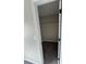 Walk-in closet provides ample storage space with a built-in shelving unit at 2716 Wynford Sw Ave, Marietta, GA 30064