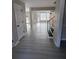 Open foyer leads into the living spaces, showcasing durable floors and ample lighting at 2716 Wynford Sw Ave, Marietta, GA 30064
