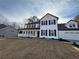 Charming two-story home featuring a welcoming front porch and attached two car garage at 2716 Wynford Sw Ave, Marietta, GA 30064