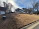 Beautiful two-story home with black shutters, a white porch, and newly seeded lawn at 2716 Wynford Sw Ave, Marietta, GA 30064