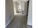 Upstairs hallway with wood-look flooring and a view of multiple rooms at 2716 Wynford Sw Ave, Marietta, GA 30064