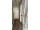 Hallway with gray flooring and views of two white doors at 2716 Wynford Sw Ave, Marietta, GA 30064