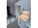 Corner nook in the kitchen with white cabinetry, quartz countertops and stainless appliances at 2716 Wynford Sw Ave, Marietta, GA 30064