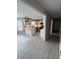 Bright, open kitchen with white cabinetry, an island, pendant lighting, and stainless steel appliances at 2716 Wynford Sw Ave, Marietta, GA 30064