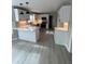Modern kitchen features sleek white cabinetry, quartz countertops, and stainless steel appliances at 2716 Wynford Sw Ave, Marietta, GA 30064