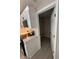 Walk-in pantry with white wire shelving and gray flooring at 2716 Wynford Sw Ave, Marietta, GA 30064