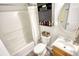 Bathroom featuring a shower, wood vanity, and a medicine cabinet at 3280 Spincaster Way, Loganville, GA 30052