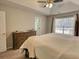 Bedroom with neutral decor and plush carpet at 3280 Spincaster Way, Loganville, GA 30052