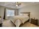 Comfortable bedroom with neutral colors, carpet, and ceiling fan at 3280 Spincaster Way, Loganville, GA 30052