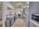 Open kitchen design with stainless steel appliances and view to dining area at 3280 Spincaster Way, Loganville, GA 30052