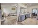 Spacious open concept layout featuring kitchen, dining and living room at 3280 Spincaster Way, Loganville, GA 30052