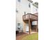 This home has a cozy back porch and small, fenced-in patio area for outdoor enjoyment at 5352 Beaver Br, Norcross, GA 30071