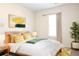 Inviting bedroom with a well-lit space, plush bedding, and stylish decor at 5352 Beaver Br, Norcross, GA 30071