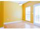 Cozy eat-in kitchen with a door to the outside and a large sunny window at 5352 Beaver Br, Norcross, GA 30071